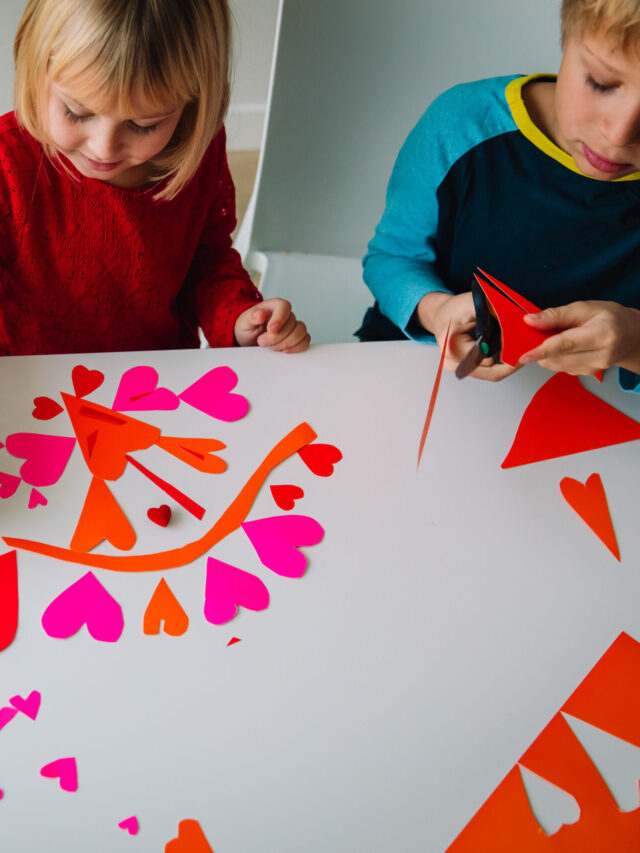 kids making hearts from paper, prepare for valentine day